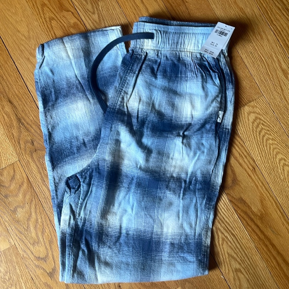 Tags still on men’s flannel pants